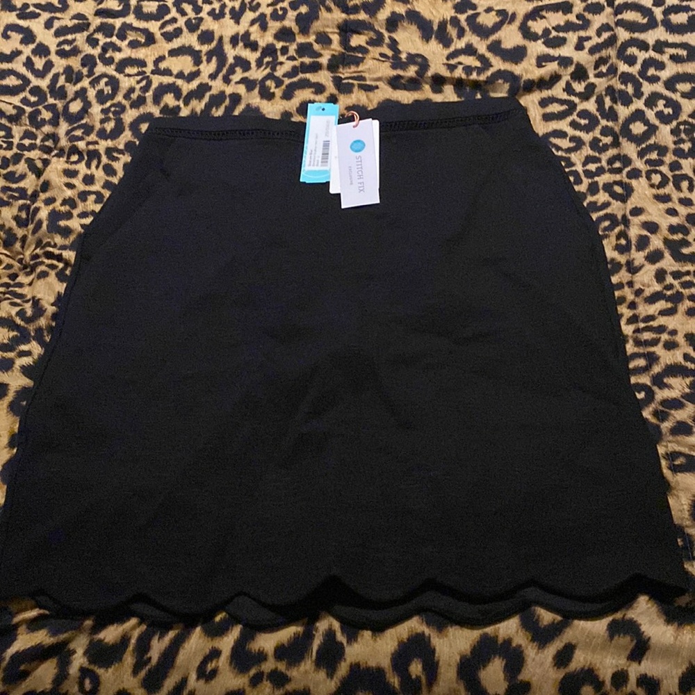 Here I have a black large STITCH FIX casual skirt too big so willing to sell